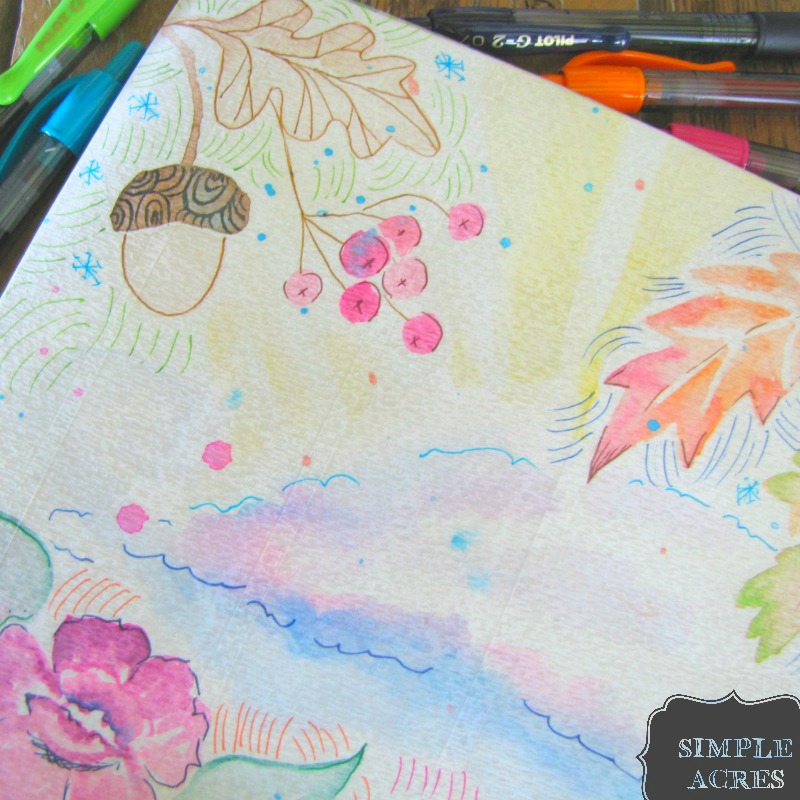 bright journal cover with pilot pens